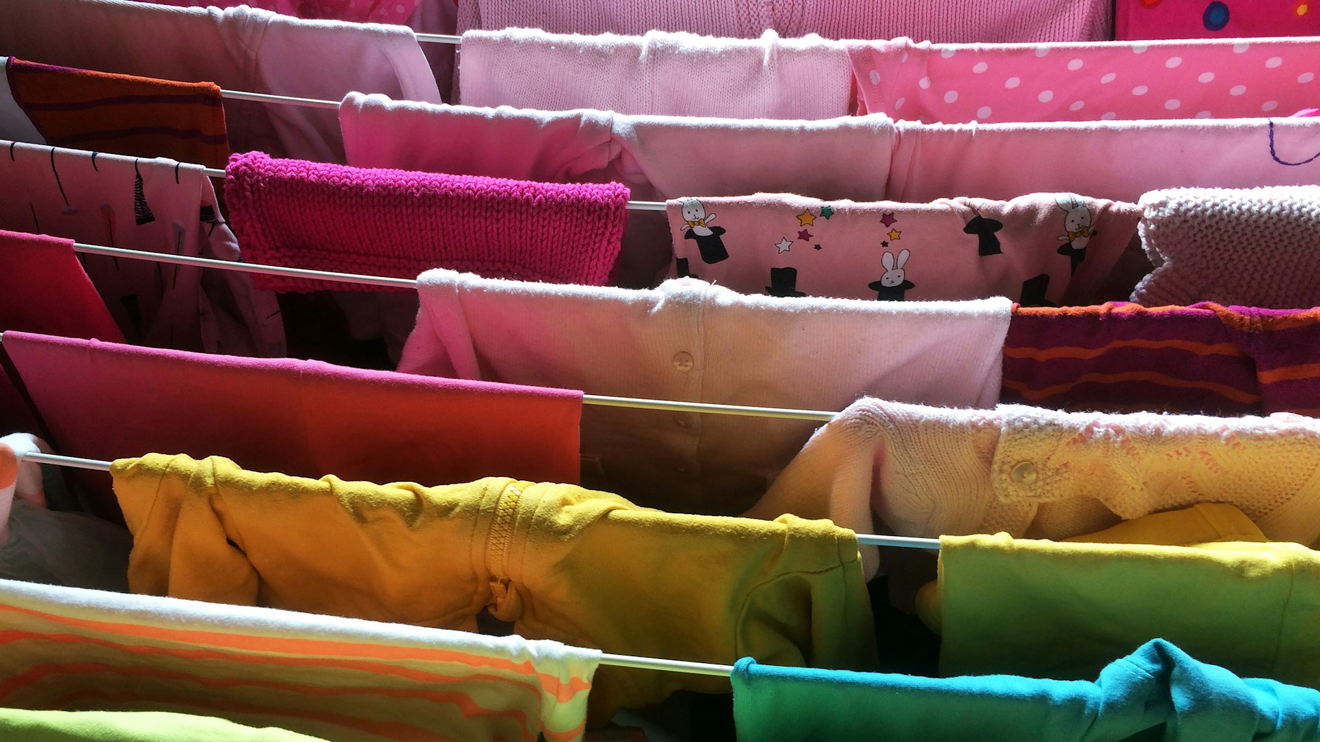 Colorful clothes hanging on a clothesline, creating a festive atmosphere